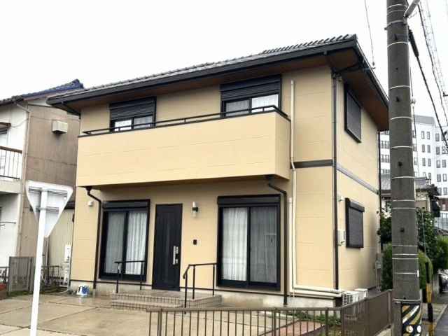 小牧市　黄土色系　和モダン住宅　外壁塗装　施工例の写真